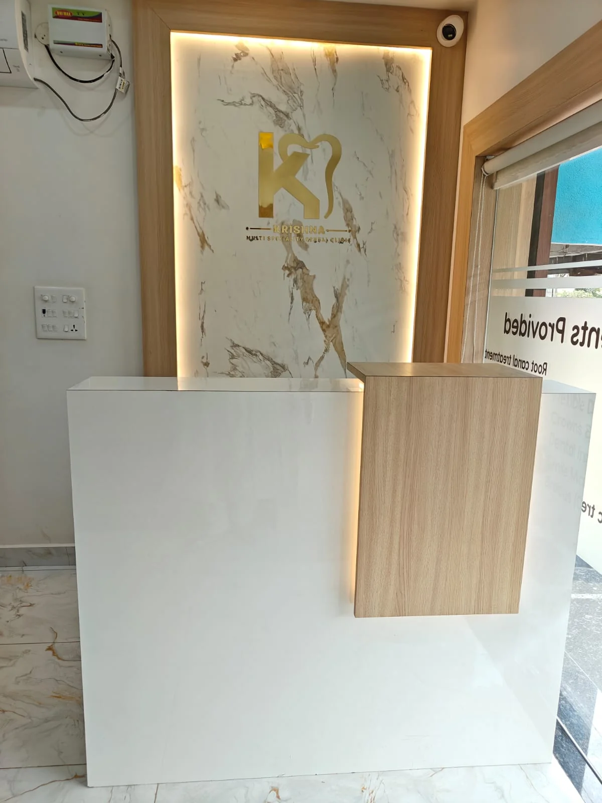 Modern welcoming reception counter at Krishna Dental Gudivada